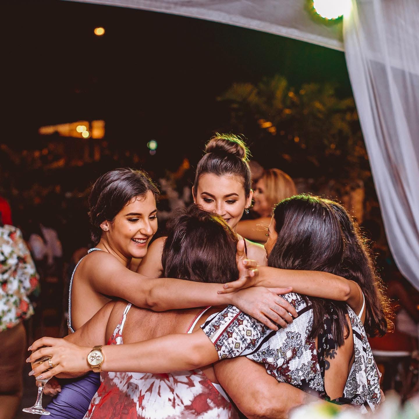Amii celebrating with clients — the community she's built